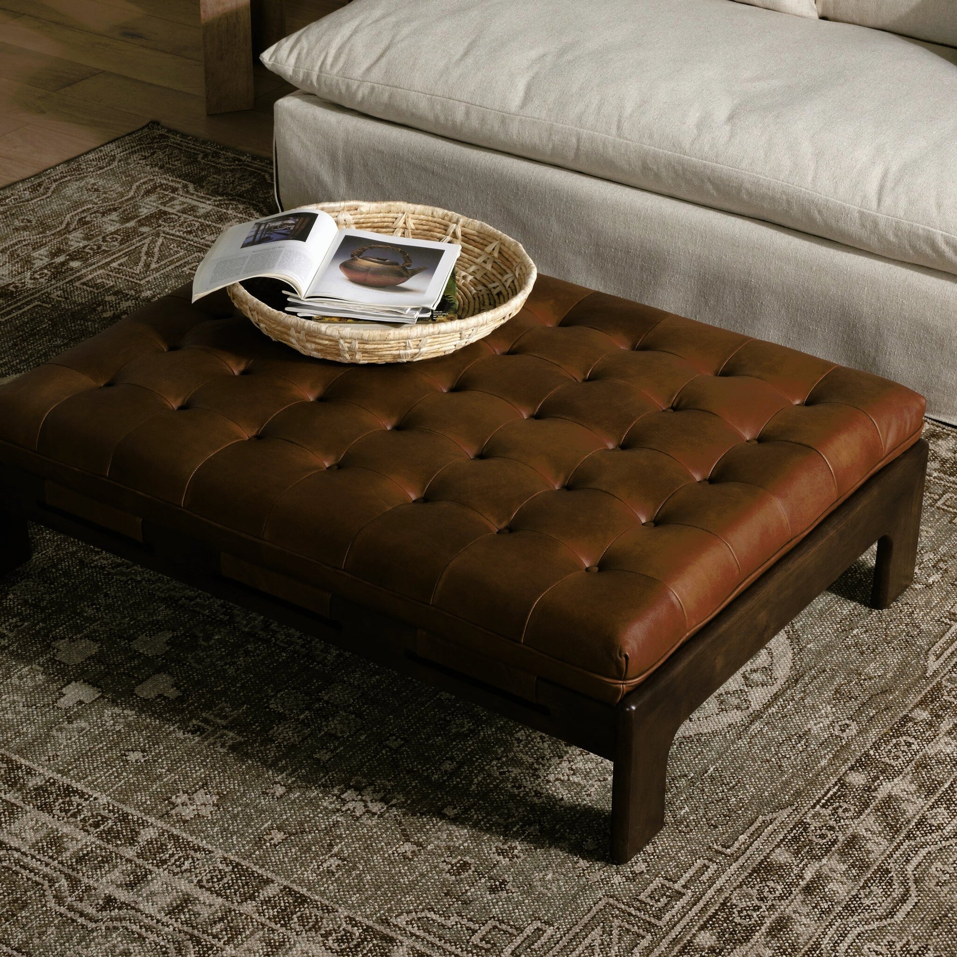 Halston Cocktail Ottoman by Four Hands. Made from top grain leather, solid ash, 100% polyester in a modern style.