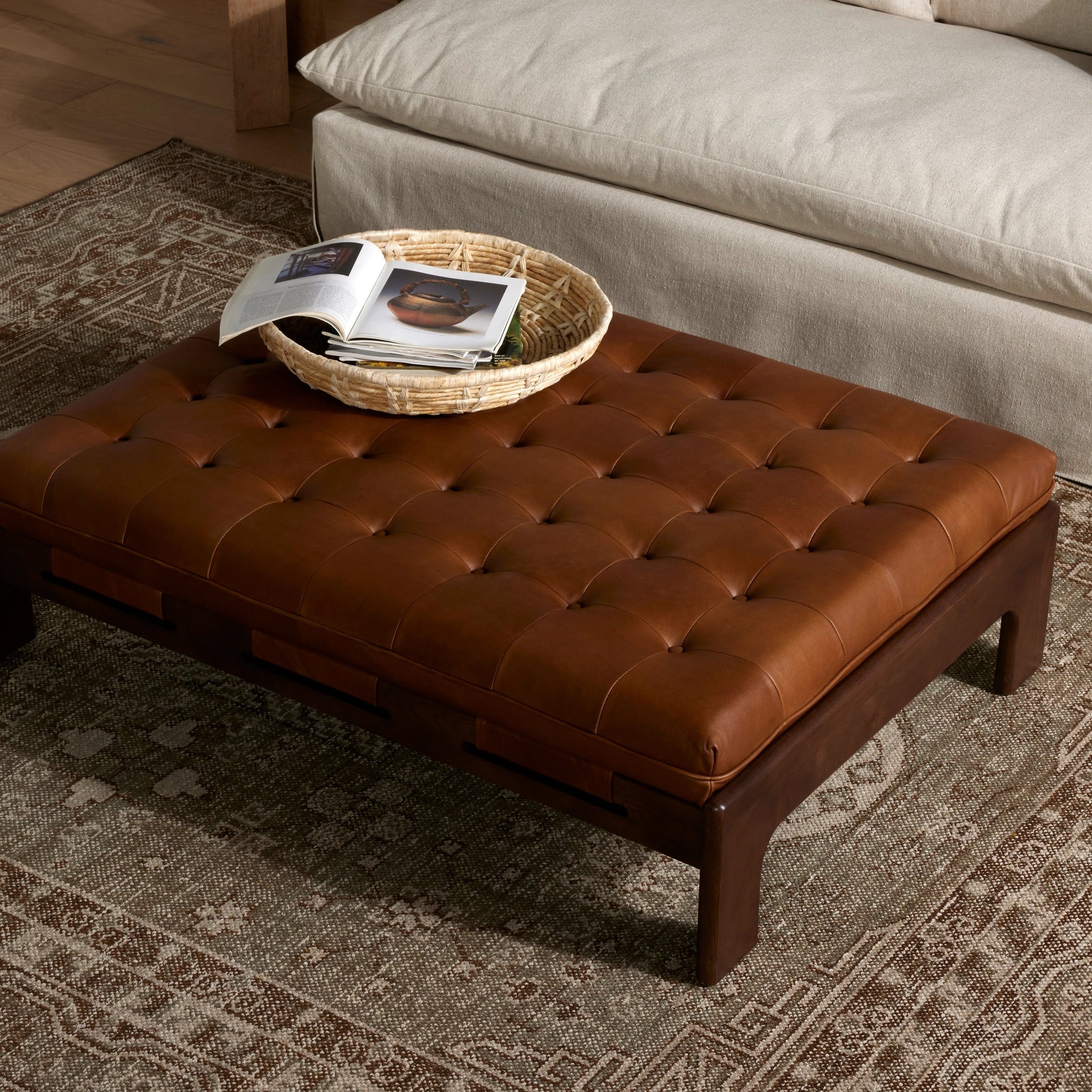 Halston Cocktail Ottoman by Four Hands. Made from top grain leather, solid ash, 100% polyester in a modern style.