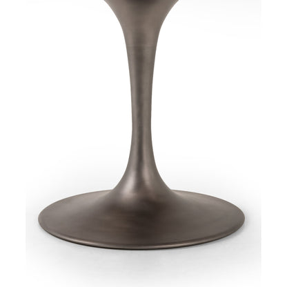 Evans Oval Dining Table by Four Hands in reclaimed burnt oak, vessel grey, polished brass. Made from solid reclaimed oak, iron, stainless steel in a modern style.