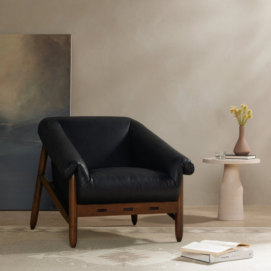 Reggie Chair by Four Hands. Made from top grain leather, solid parawood, 100% polyester in a modern style.