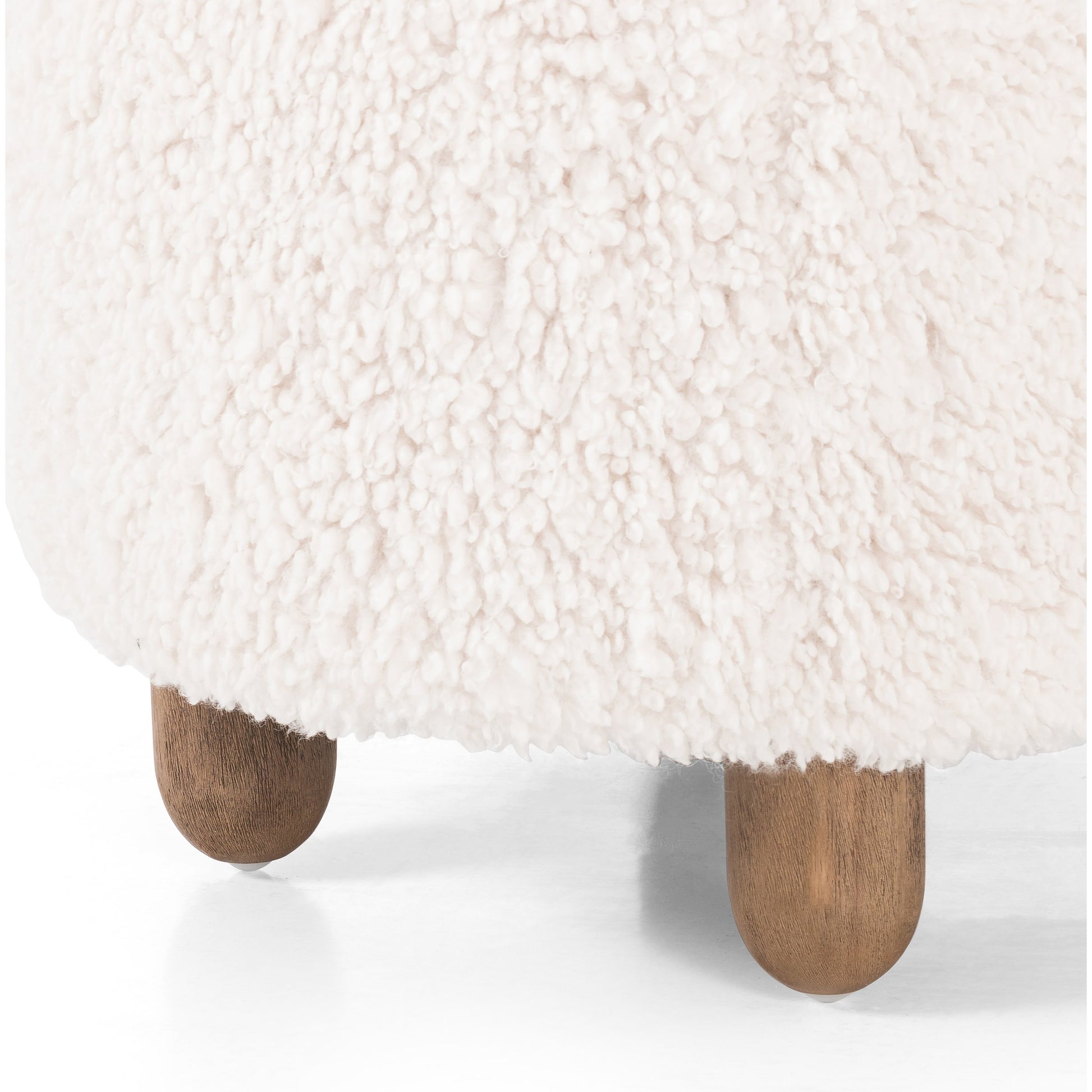 Aniston Ottoman by Four Hands. Made from unique in a transitional style.