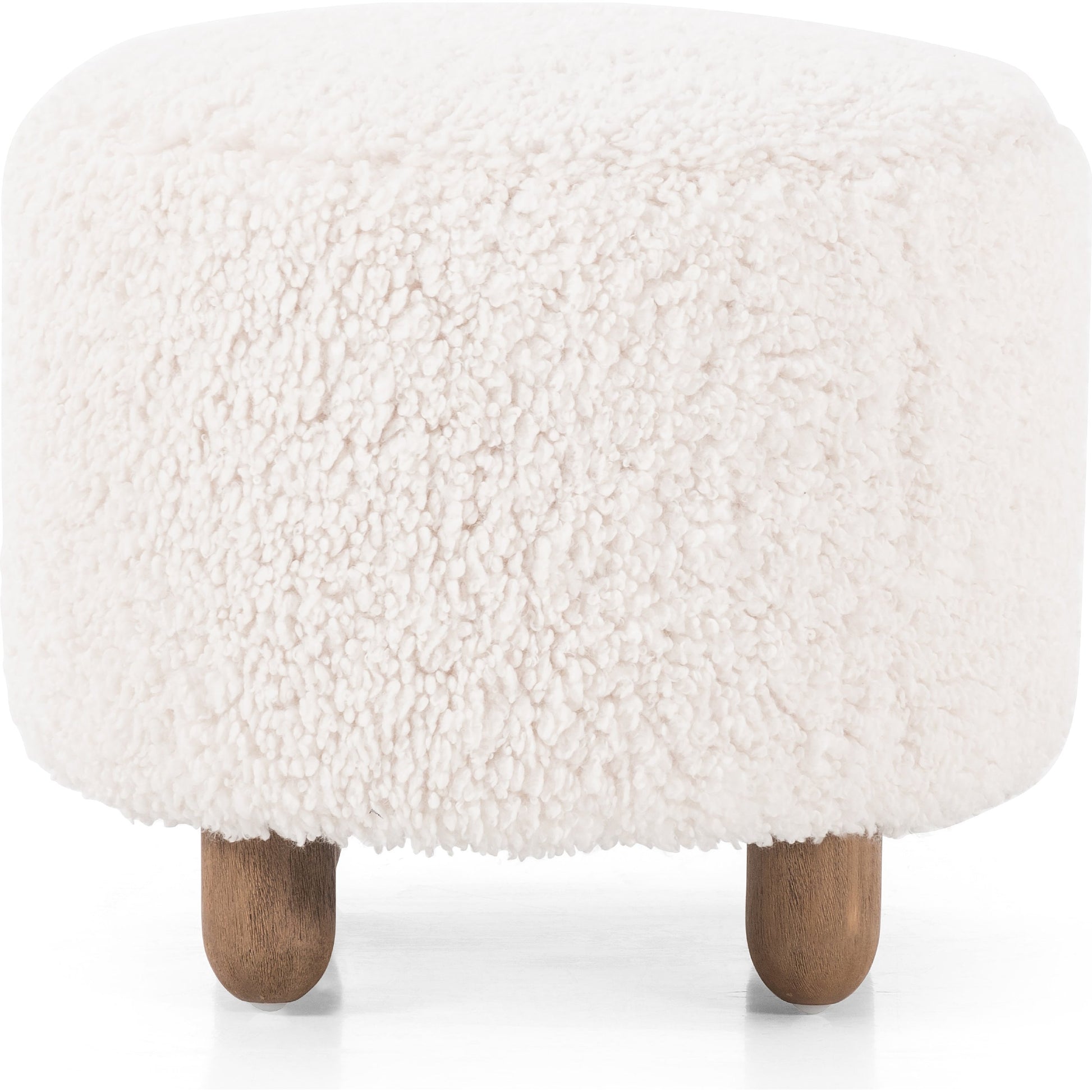Aniston Ottoman by Four Hands. Made from unique in a transitional style.