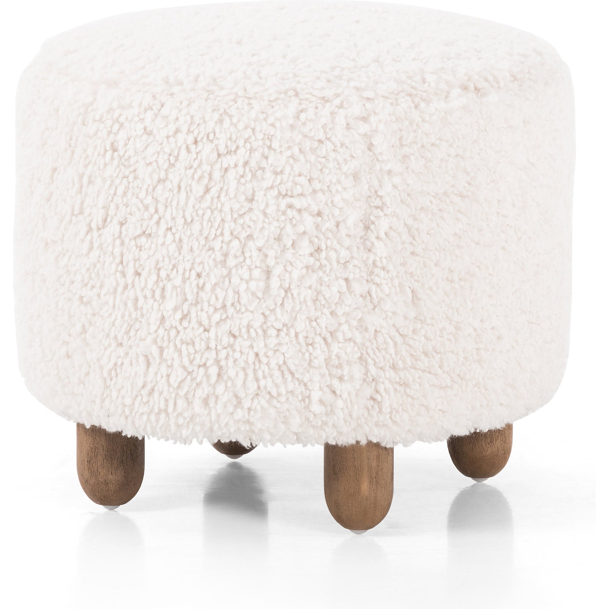 Aniston Ottoman by Four Hands. Made from unique in a transitional style.