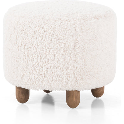 Aniston Ottoman by Four Hands. Made from unique in a transitional style.