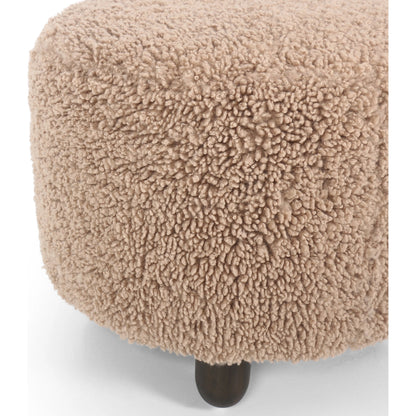 Aniston Ottoman by Four Hands. Made from unique in a transitional style.
