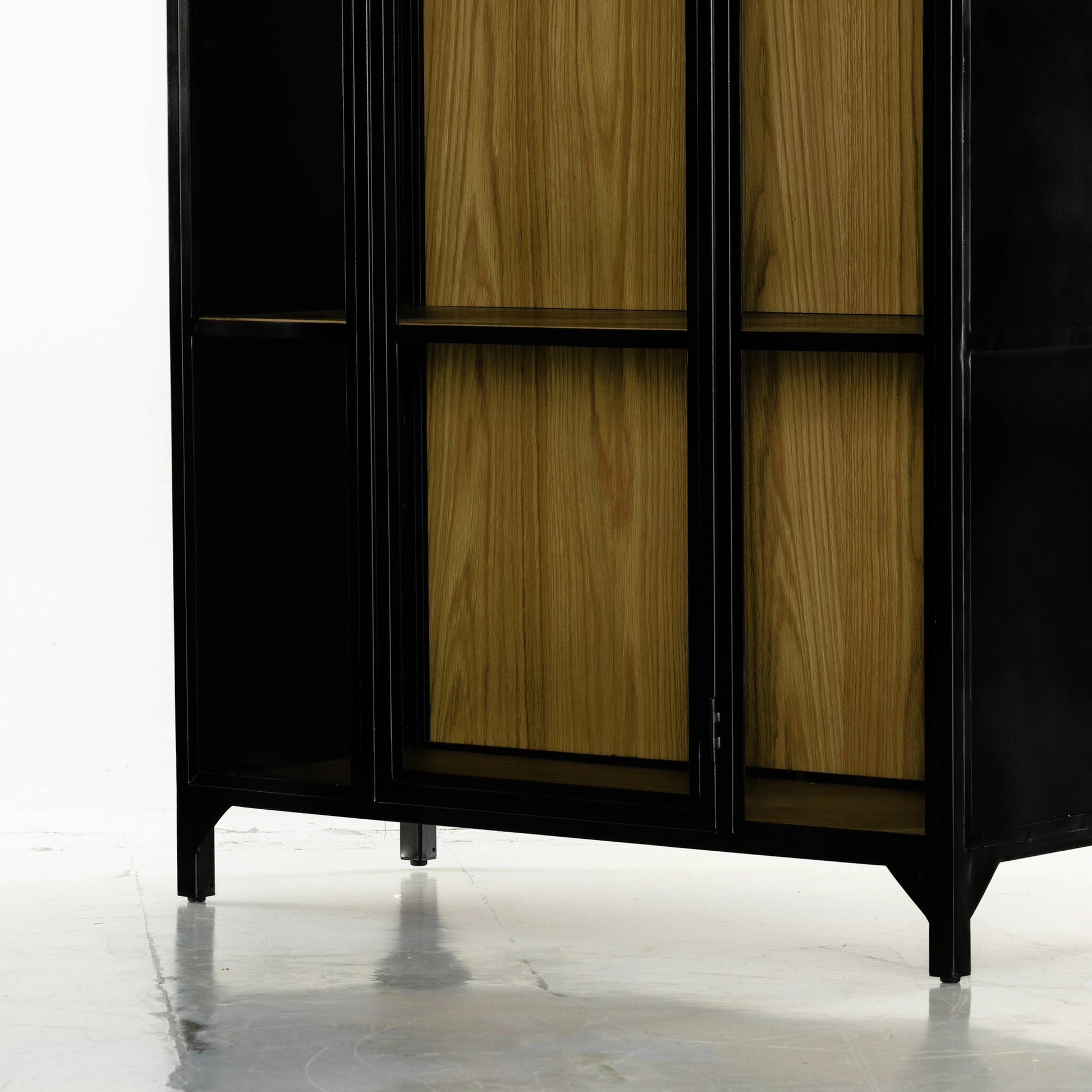 Belmont Cabinet by Four Hands. Made from iron in a transitional style.
