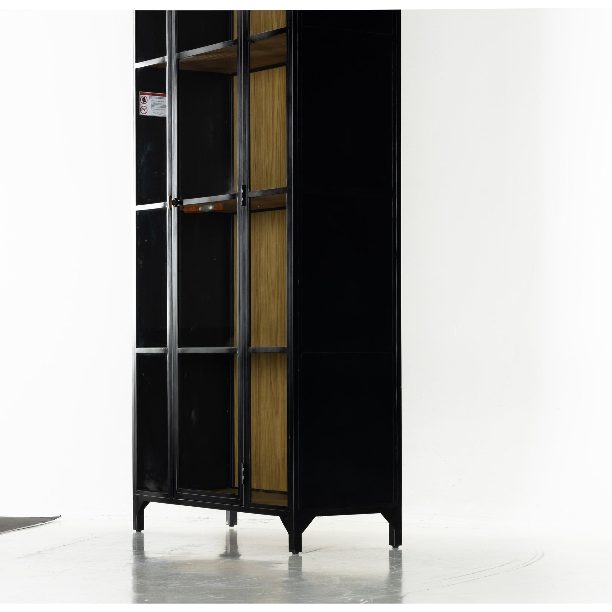 Belmont Cabinet by Four Hands. Made from iron in a transitional style.