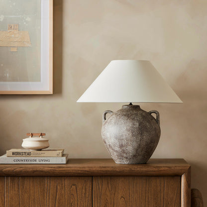 Mays Table Lamp by Four Hands in light sand porcelain. Made from ceramic, 65% polyester, 35% flax, linen, thermoplastic in a modern style.