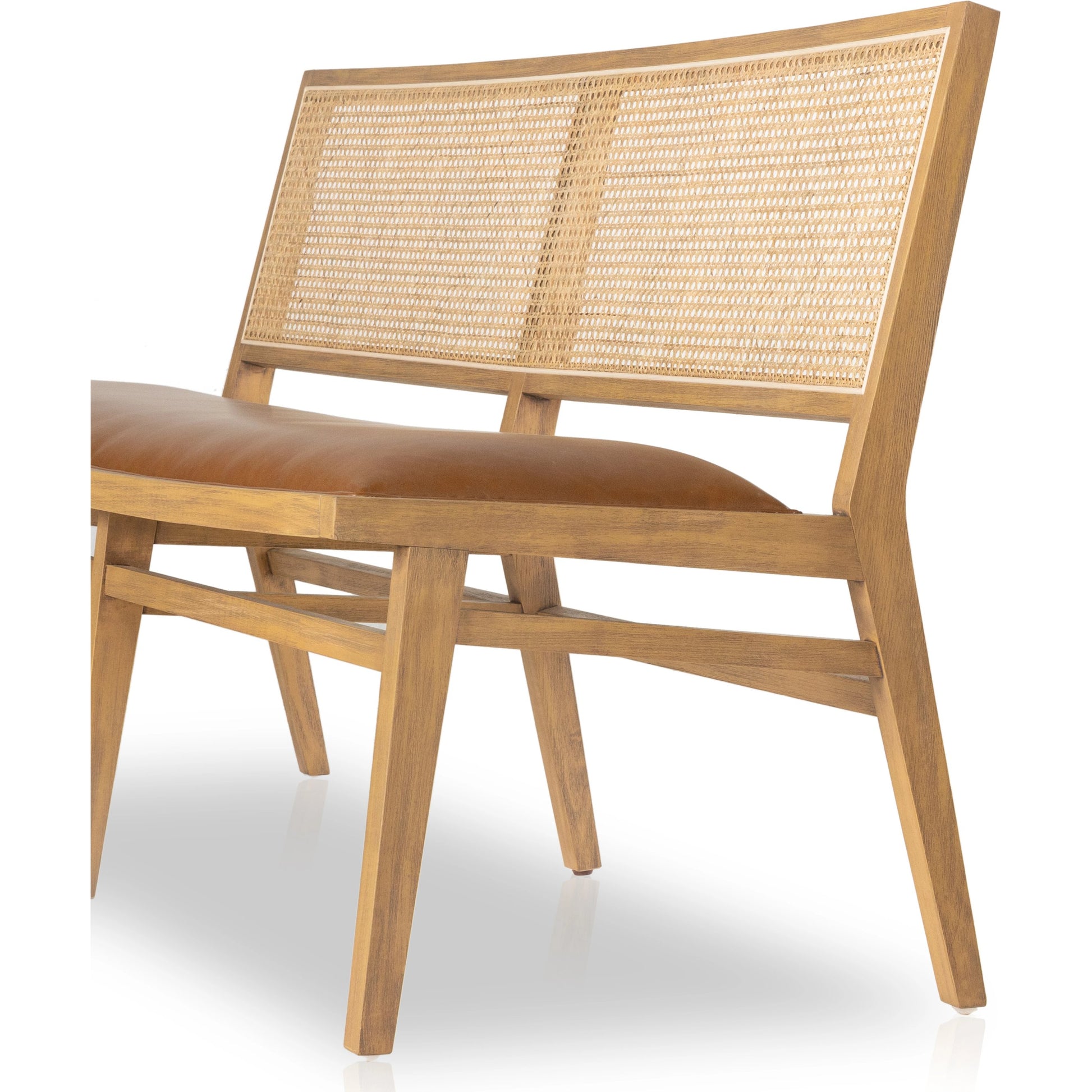 Sage Dining Bench by Four Hands in sierra butterscotch. Made from faux leather, solid beech, cane in a modern style.