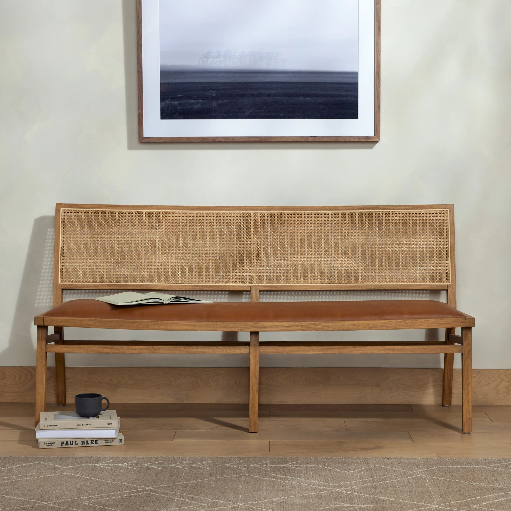 Sage Dining Bench by Four Hands in sierra butterscotch. Made from faux leather, solid beech, cane in a modern style.
