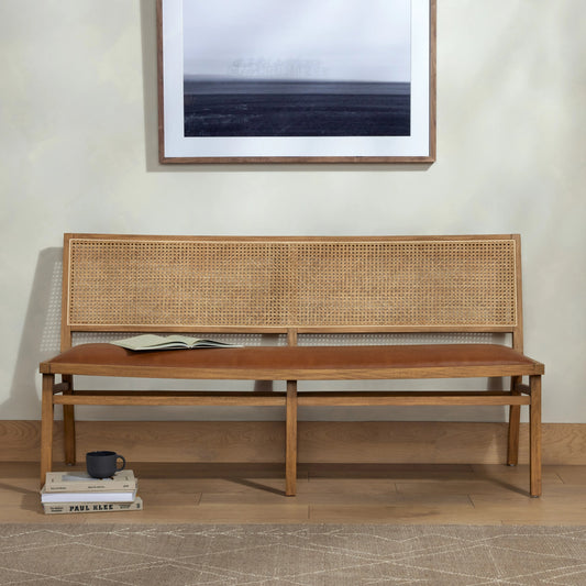 Sage Dining Bench by Four Hands in sierra butterscotch. Made from faux leather, solid beech, cane in a modern style.