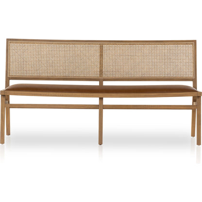 Sage Dining Bench by Four Hands in sierra butterscotch. Made from faux leather, solid beech, cane in a modern style.