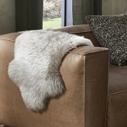 Lalo Ombre Throw by Four Hands. Made from shearling in a transitional style.