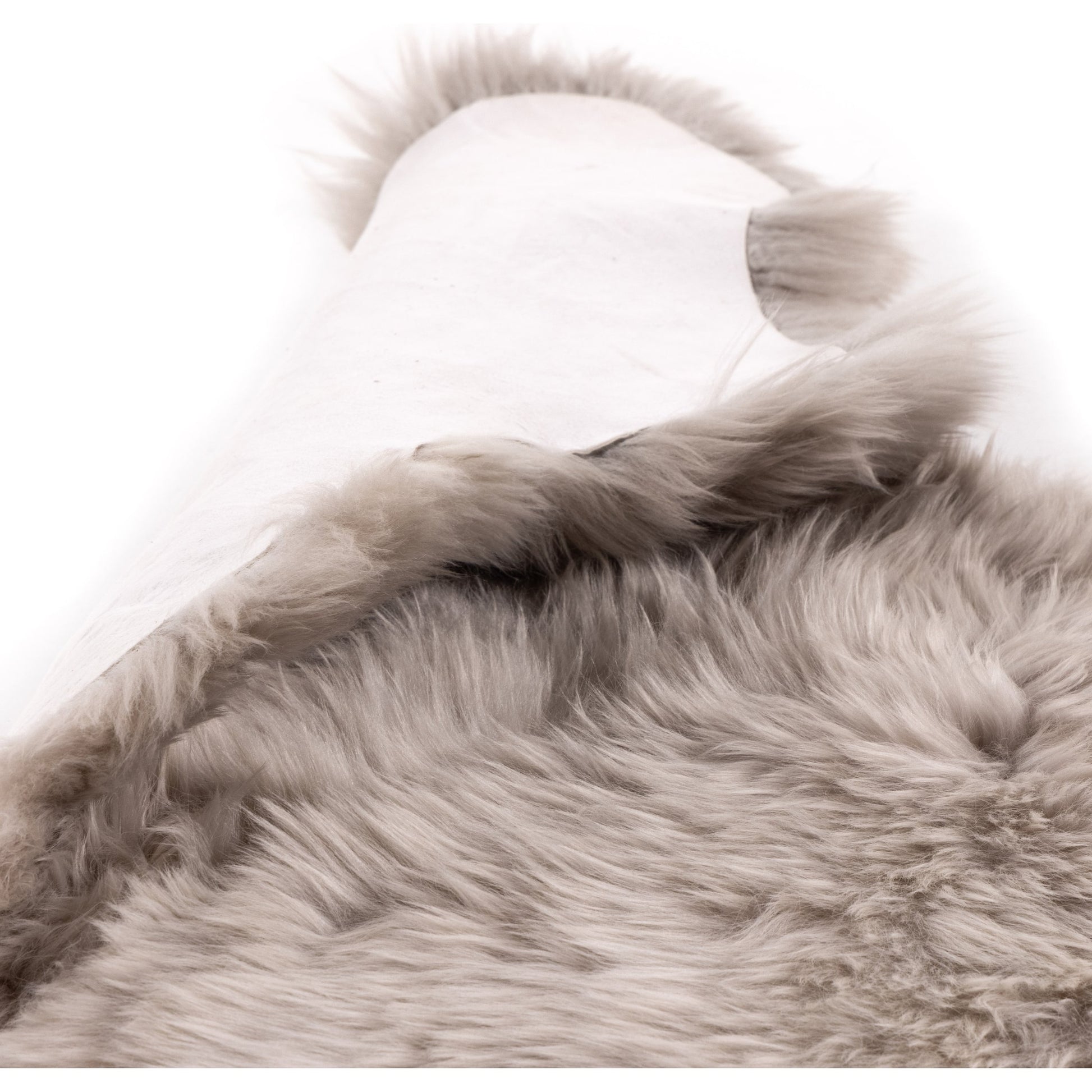 Lalo Ombre Throw by Four Hands. Made from shearling in a transitional style.