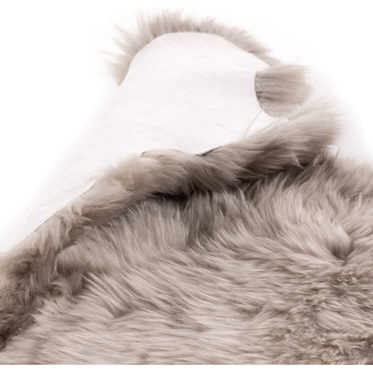 Lalo Ombre Throw by Four Hands. Made from shearling in a transitional style.