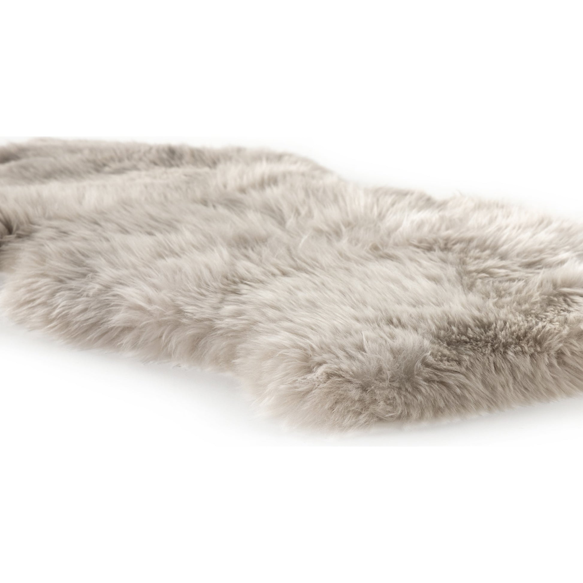 Lalo Ombre Throw by Four Hands. Made from shearling in a transitional style.