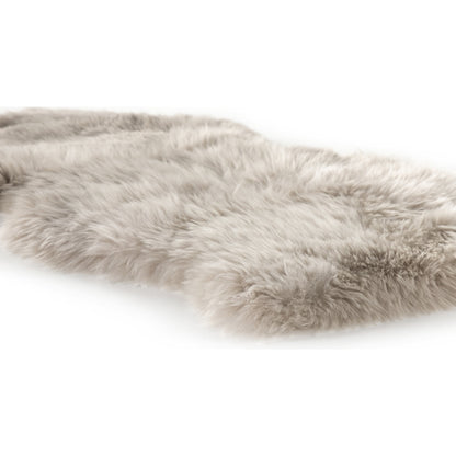 Lalo Ombre Throw by Four Hands. Made from shearling in a transitional style.