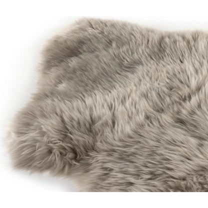 Lalo Ombre Throw by Four Hands. Made from shearling in a transitional style.