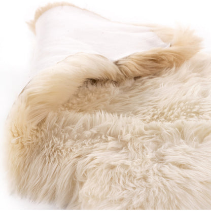Lalo Ombre Throw by Four Hands. Made from shearling in a transitional style.