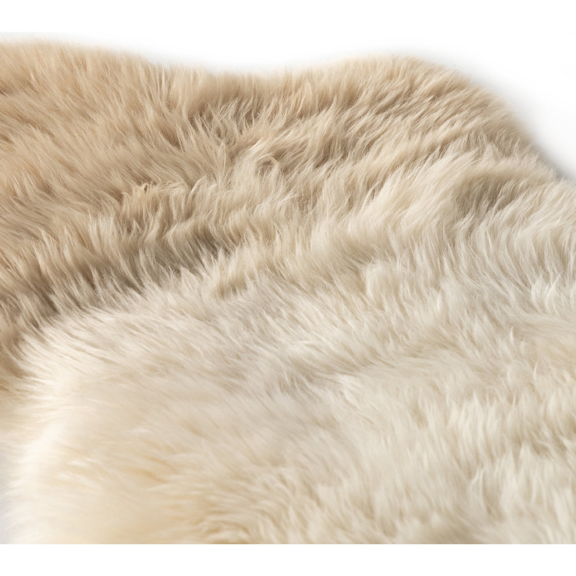 Lalo Ombre Throw by Four Hands. Made from shearling in a transitional style.