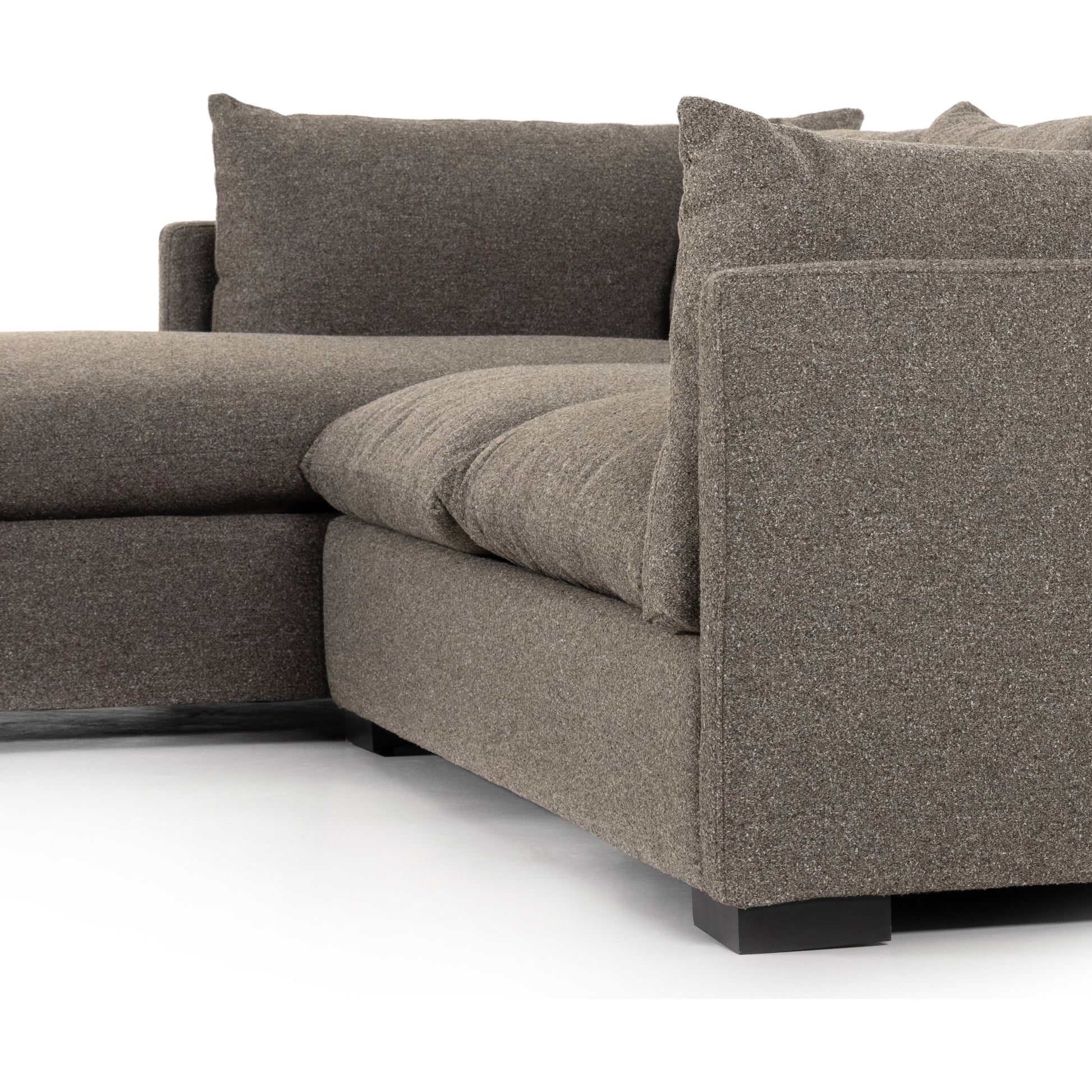 Westwood 112" 2-Piece Sectional by Four Hands in bennett charcoal. Made from 100% polyester, solid banak, solid pine in a transitional style.