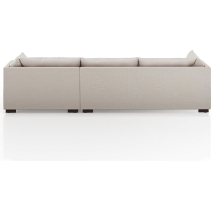 Westwood 112" 2-Piece Sectional by Four Hands in bennett charcoal. Made from 100% polyester, solid banak, solid pine in a transitional style.
