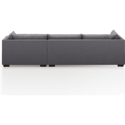 Westwood 112" 2-Piece Sectional by Four Hands in bennett charcoal. Made from 100% polyester, solid banak, solid pine in a transitional style.