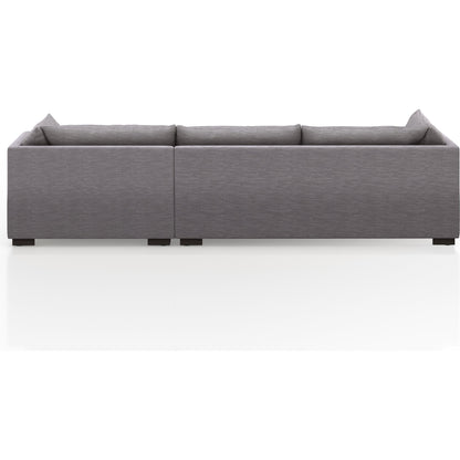 Westwood 112" 2-Piece Sectional by Four Hands in bennett charcoal. Made from 100% polyester, solid banak, solid pine in a transitional style.
