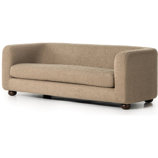 Gidget Sofa by Four Hands in sheepskin camel and almond. Made from 100% polyester, solid parawood in a transitional style.
