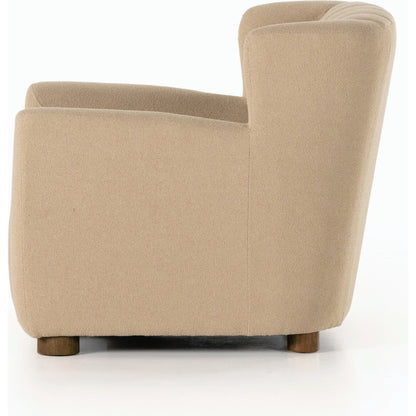 Elora Chair by Four Hands in sheepskin camel. Made from 100% polyester, solid parawood, 100% polypropylene in a transitional style.