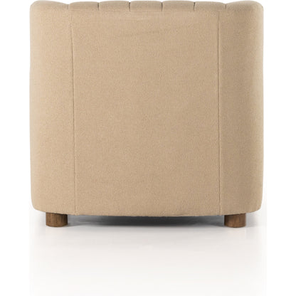 Elora Chair by Four Hands in sheepskin camel. Made from 100% polyester, solid parawood, 100% polypropylene in a transitional style.