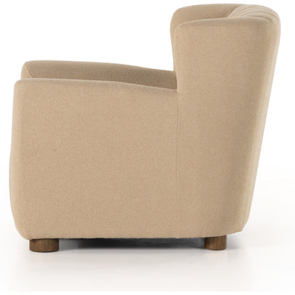 Elora Chair by Four Hands in sheepskin camel. Made from 100% polyester, solid parawood, 100% polypropylene in a transitional style.