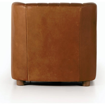 Elora Chair by Four Hands in sheepskin camel. Made from 100% polyester, solid parawood, 100% polypropylene in a transitional style.