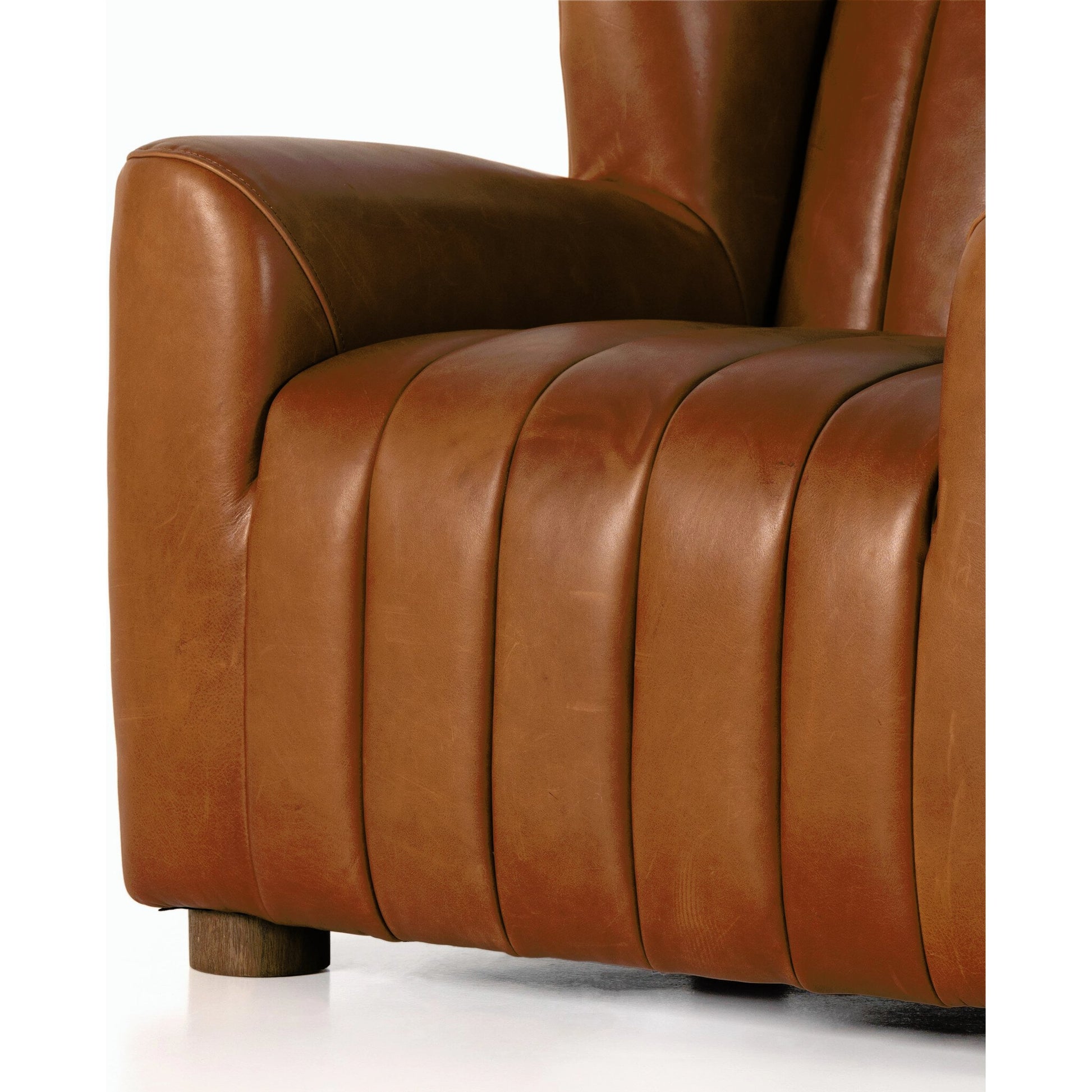 Elora Chair by Four Hands in sheepskin camel. Made from 100% polyester, solid parawood, 100% polypropylene in a transitional style.