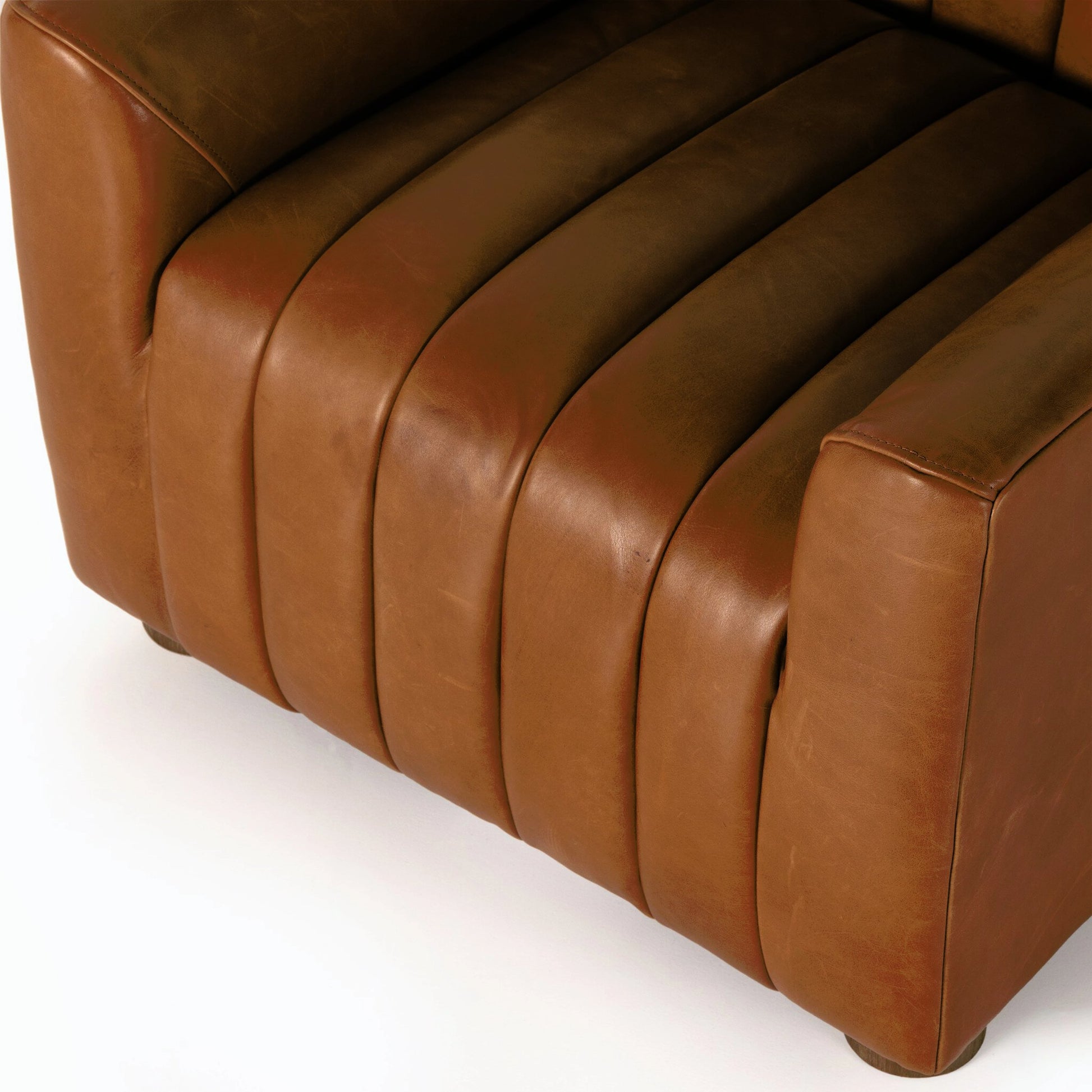 Elora Chair by Four Hands in sheepskin camel. Made from 100% polyester, solid parawood, 100% polypropylene in a transitional style.