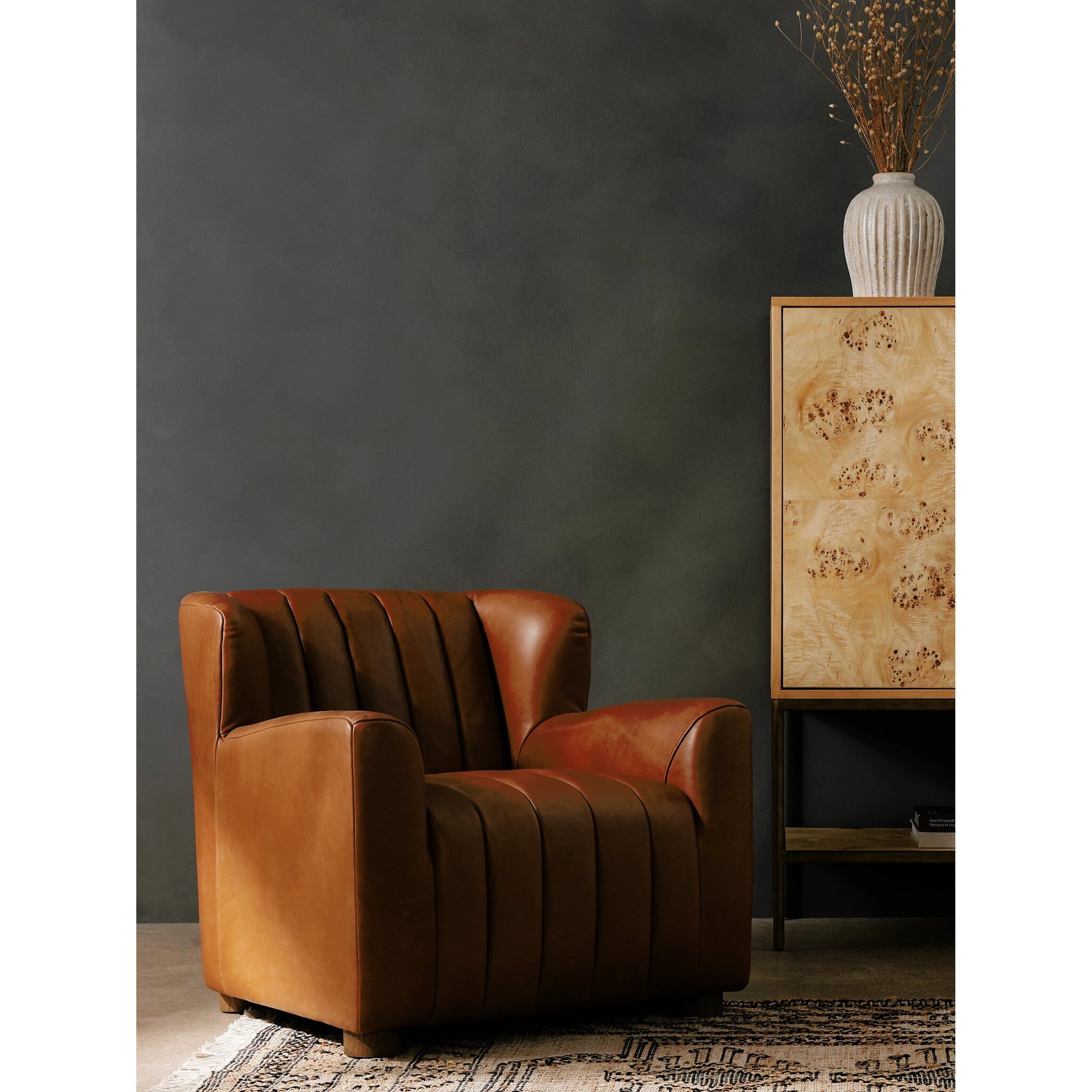 Elora Chair by Four Hands in sheepskin camel. Made from 100% polyester, solid parawood, 100% polypropylene in a transitional style.