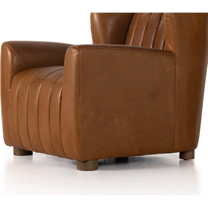 Elora Chair by Four Hands in sheepskin camel. Made from 100% polyester, solid parawood, 100% polypropylene in a transitional style.