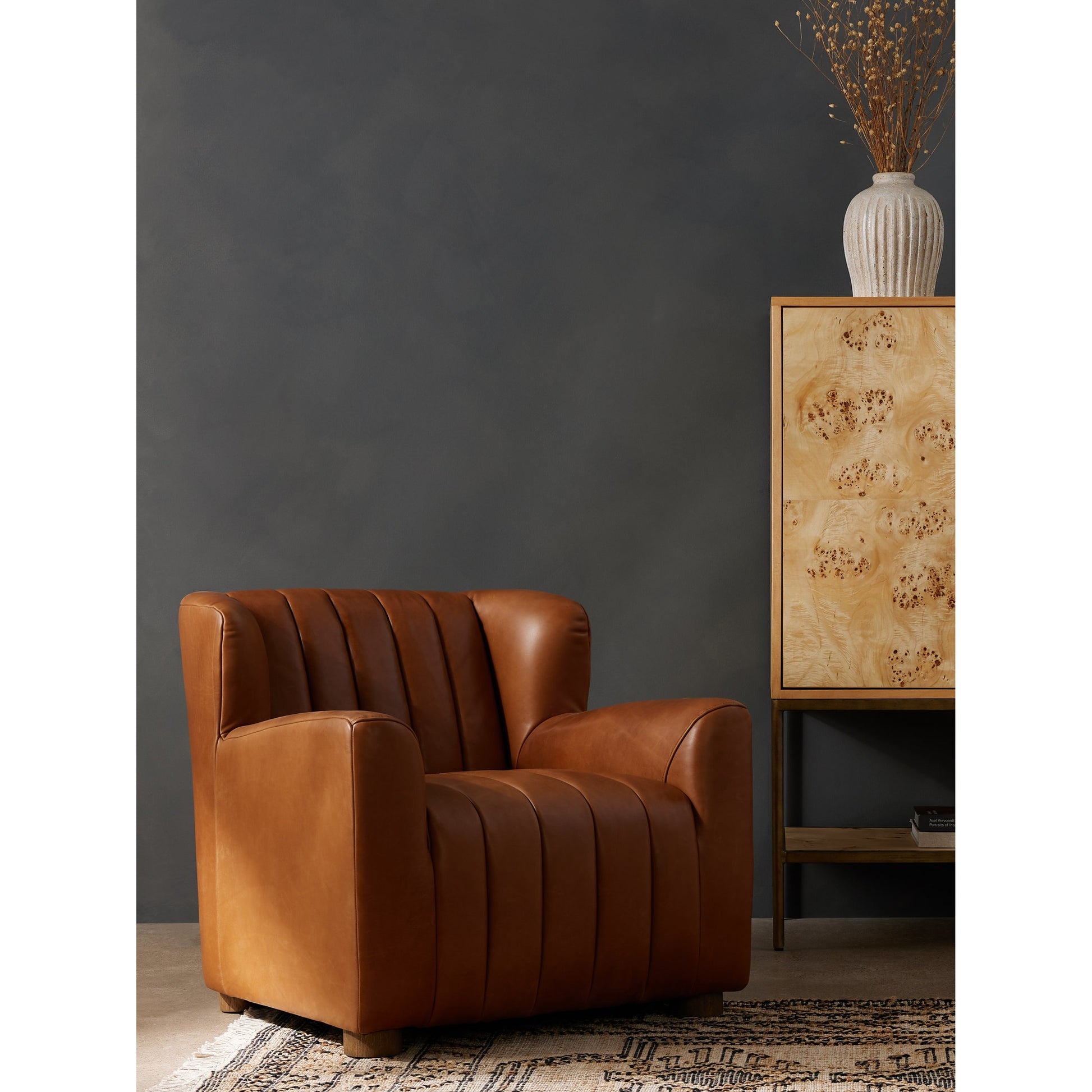 Elora Chair by Four Hands in sheepskin camel. Made from 100% polyester, solid parawood, 100% polypropylene in a transitional style.