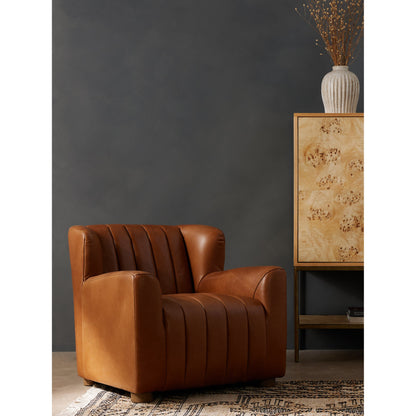 Elora Chair by Four Hands in sheepskin camel. Made from 100% polyester, solid parawood, 100% polypropylene in a transitional style.