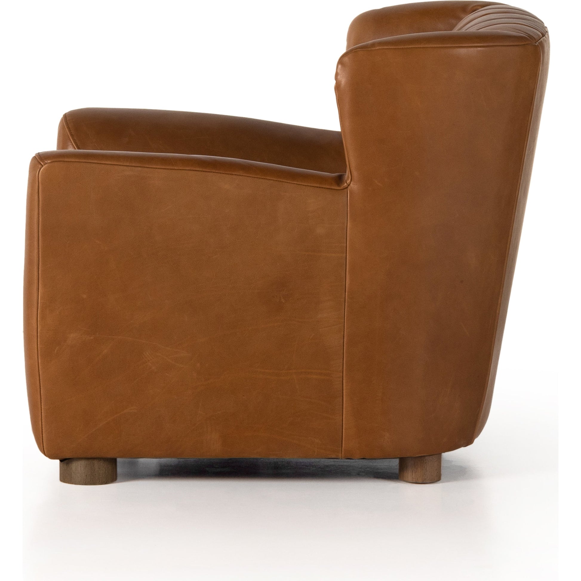 Elora Chair by Four Hands in sheepskin camel. Made from 100% polyester, solid parawood, 100% polypropylene in a transitional style.