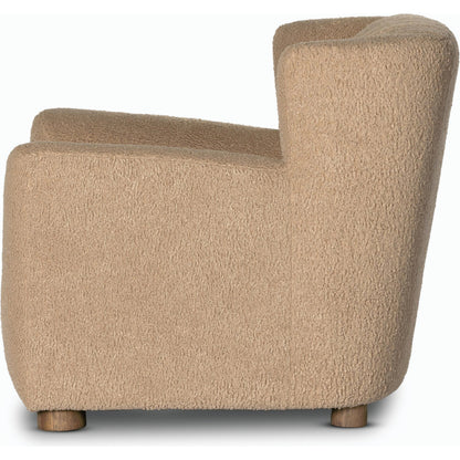 Elora Chair by Four Hands in sheepskin camel. Made from 100% polyester, solid parawood, 100% polypropylene in a transitional style.