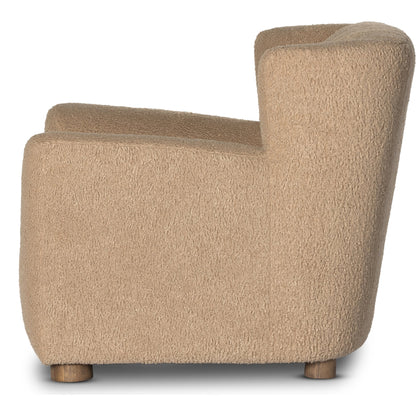 Elora Chair by Four Hands in sheepskin camel. Made from 100% polyester, solid parawood, 100% polypropylene in a transitional style.