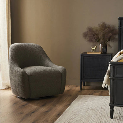 Levi Swivel Chair by Four Hands. Made from 95% polyester, 5% acrylic, solid pine, 98% polyurethane foam, 2% fiber in a modern style.