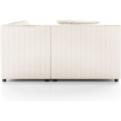 Augustine Dining Banquette by Four Hands in capri oatmeal. Made from 100% polyester, 80% polyurethane foam, 20% polyester fiber in a modern style.