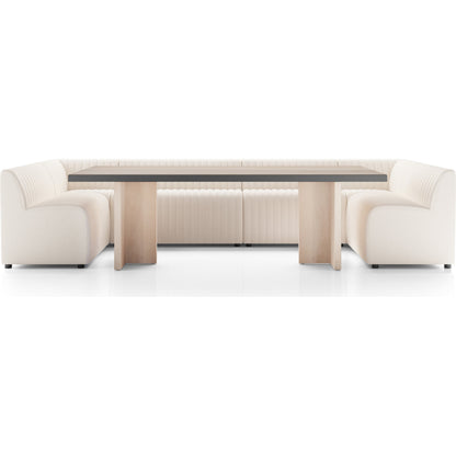 Augustine Dining Banquette by Four Hands in capri oatmeal. Made from 100% polyester, 80% polyurethane foam, 20% polyester fiber in a modern style.