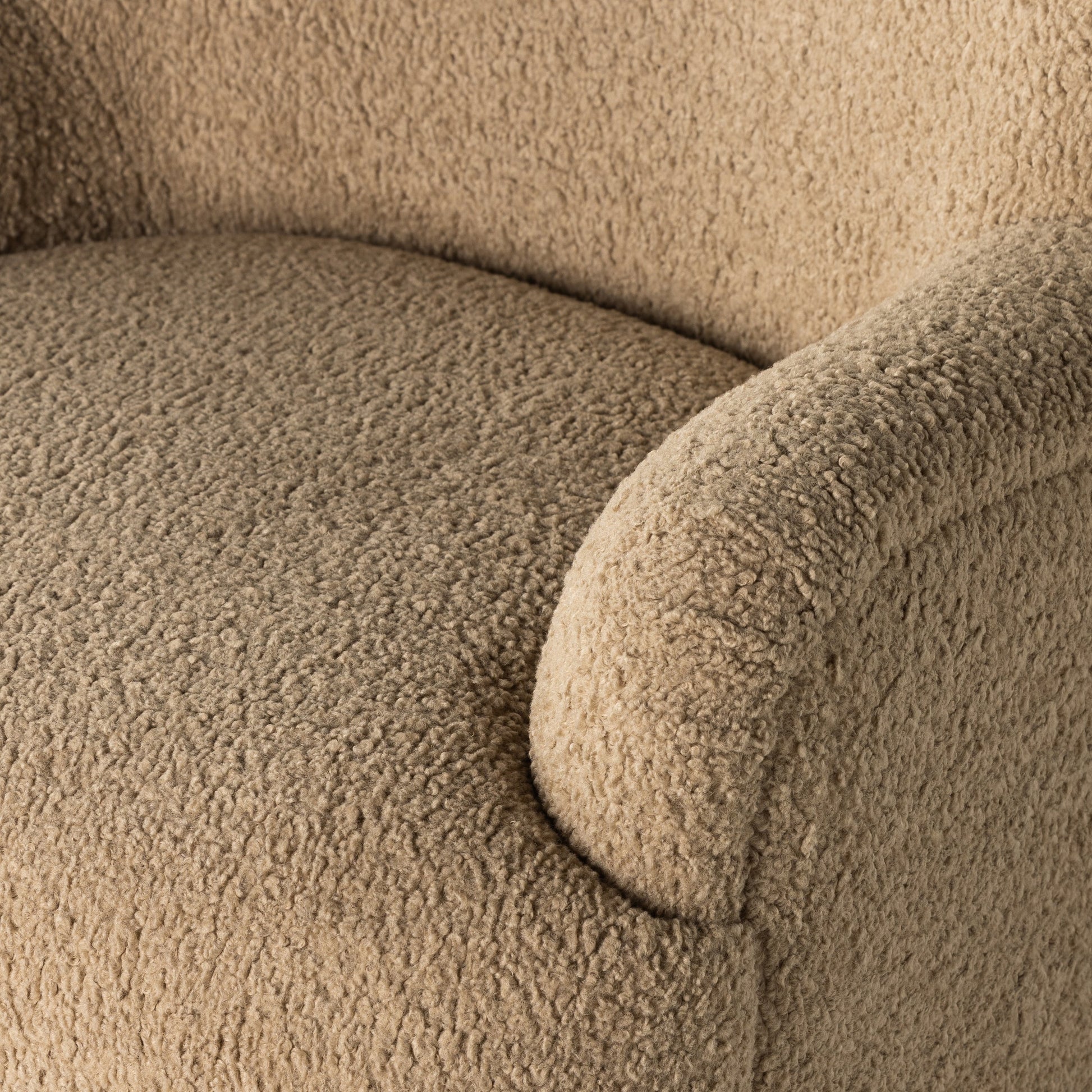 Kadon Swivel Chair by Four Hands in sheepskin camel. Made from 100% polyester, eucalyptus plywood, 100% polypropylene in a modern style.