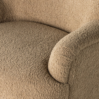 Kadon Swivel Chair by Four Hands in sheepskin camel. Made from 100% polyester, eucalyptus plywood, 100% polypropylene in a modern style.