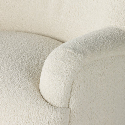 Kadon Swivel Chair by Four Hands in sheepskin camel. Made from 100% polyester, eucalyptus plywood, 100% polypropylene in a modern style.