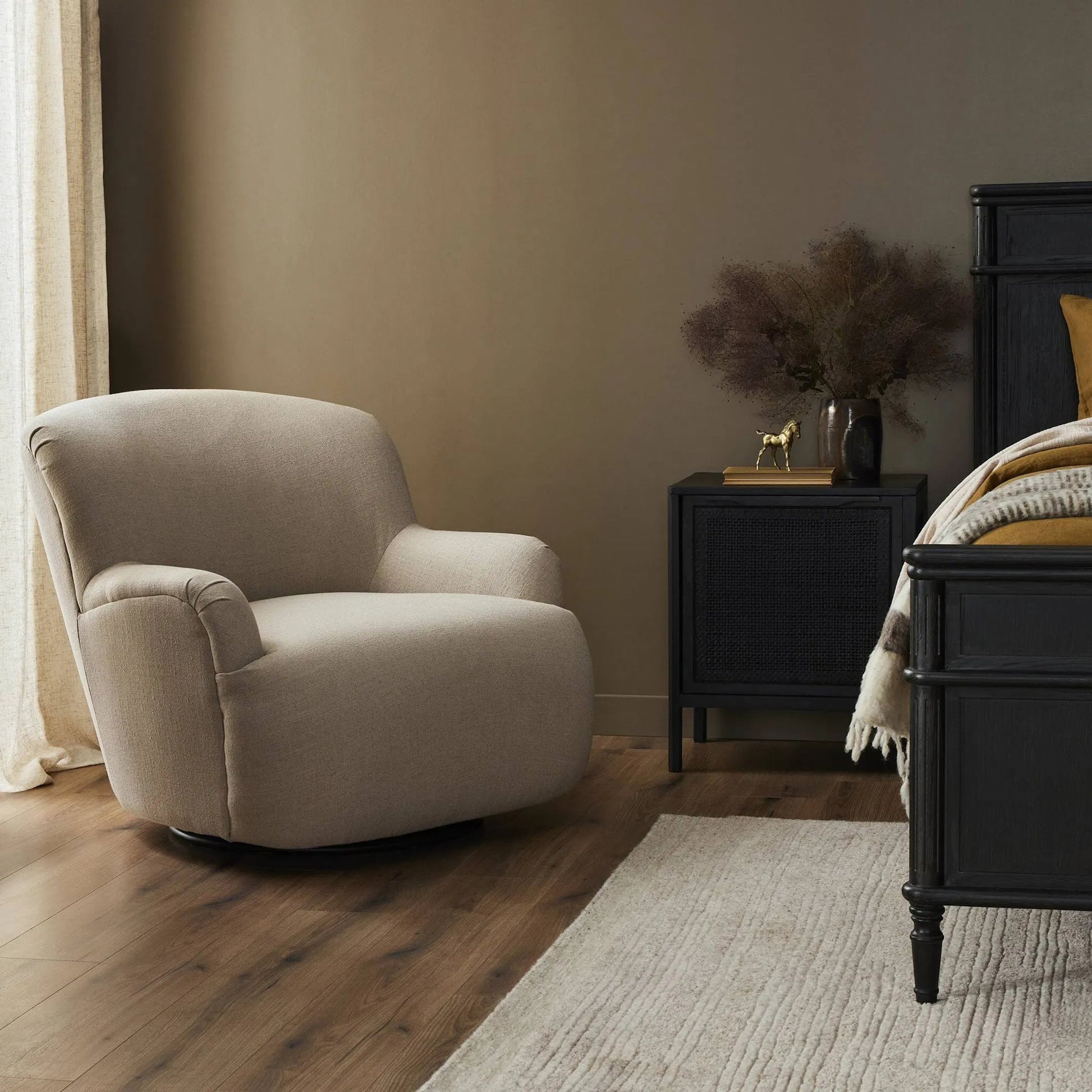 Kadon Swivel Chair by Four Hands in sheepskin camel. Made from 100% polyester, eucalyptus plywood, 100% polypropylene in a modern style.