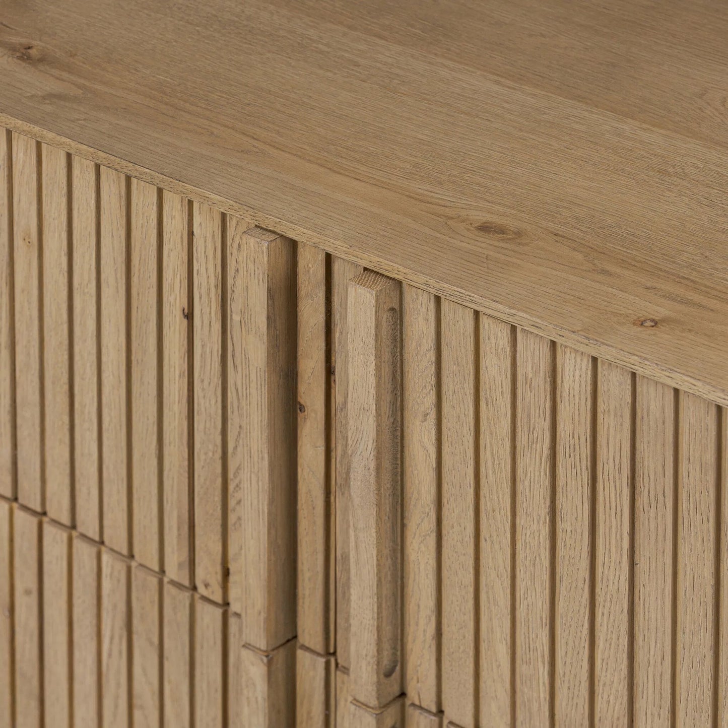 010 SI-2519225 | Closeup | Leo 6 Drawer Dresser by Four Hands in rustic light natural oak, rustic light natural oak veneer. Made from solid oak, thick oak veneer in a transitional style.